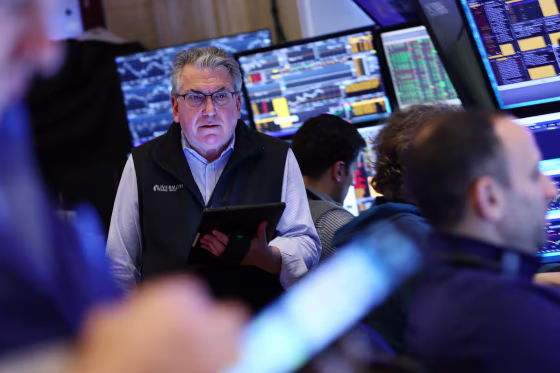 Traders work on the floor of the New York Stock Exchange during morning trading on April 11, 2025 in New York City. 