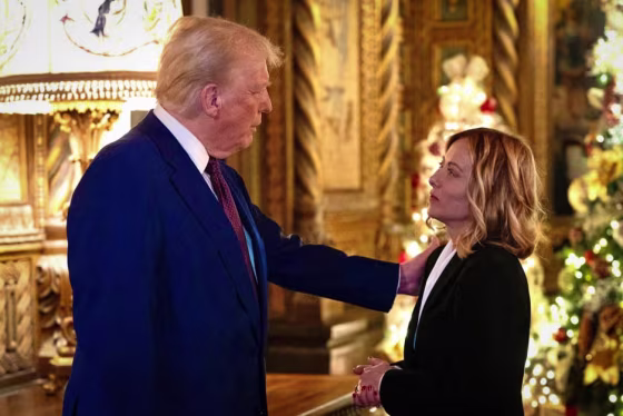 Italy's Prime Minister Giorgia Meloni talks with President-elect Donald Trump at his Mar-A-Lago Club on Jan. 4, 2025 in Palm Beach, Fla.