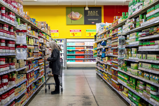A person browses at a grocery store.