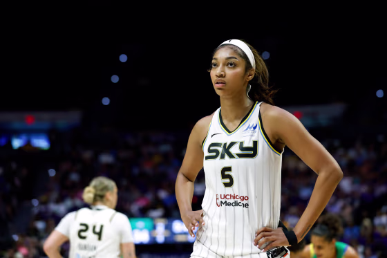 Angel Reese stands on the basketball court