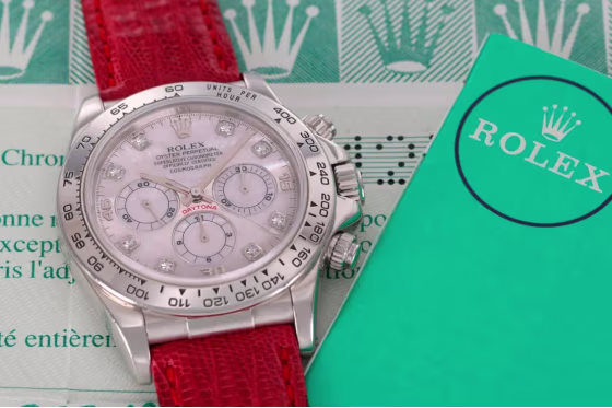 A rare 1999 platinum Rolex Daytona featuring a mother-of-pearl dial with diamond hour markers