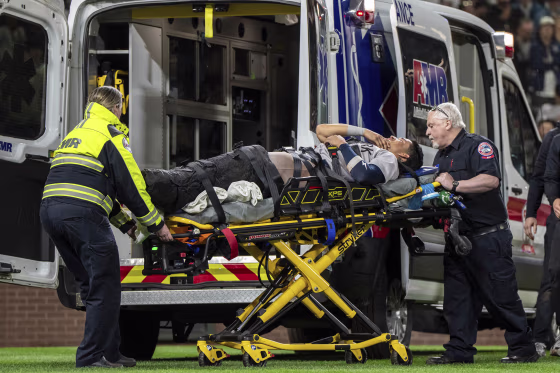 New York Yankees' Oswaldo Cabrera is taken from the field on a stretcher after injuring his leg.