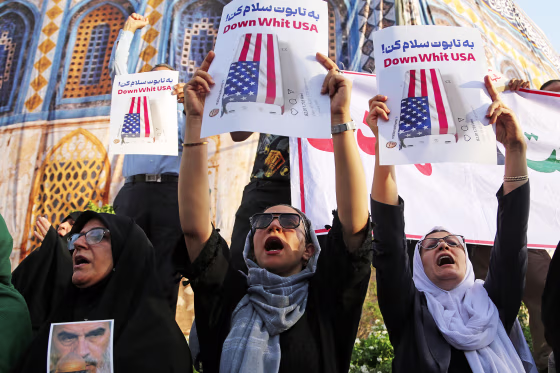 Iranians gather at the Revolution Square in Tehran to protest US attacks
