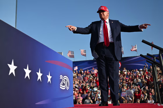 Image: donald trump politics political politician des moines iowa red maga hat