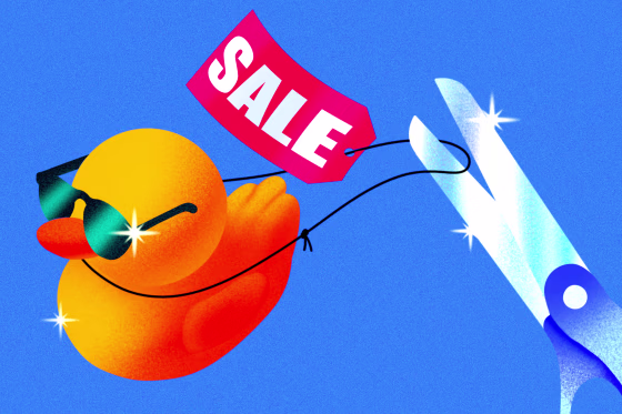 Rubber duck with a "SALE" tag being cut off of it.