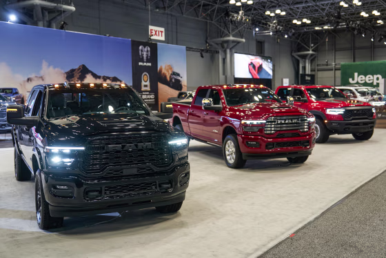 2025 Ram 2500 pickup trucks inside of a showroom