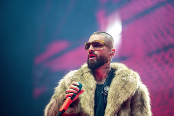 Maluma performs on stage