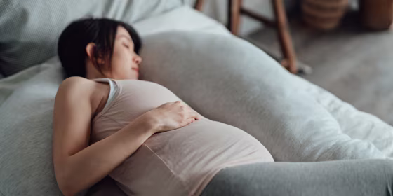 Your body undergoes a lot of changes during pregnancy, leading to back pain, swelling and even carpal tunnel. A pregnancy pillow can make you more comfortable overnight.