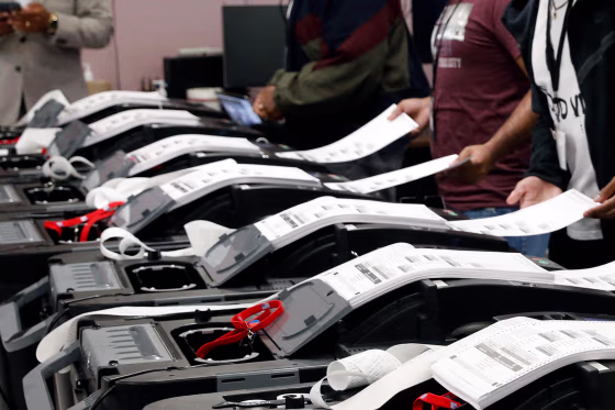 The Detroit Department of Elections performs a public accuracy test of its equipment, which is made by Dominion Voting Systems, in advance of a primary in 2022. 