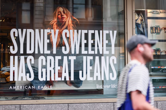 A window display of actress Sydney Sweeney is seen on a window of an American Eagle store from outside on the street