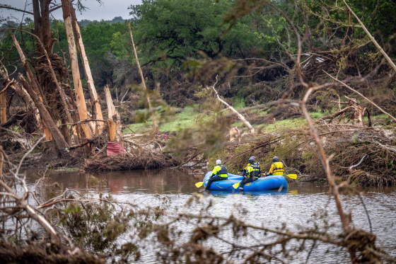 Search and Recover unit paddles along the Guadalupe River 
