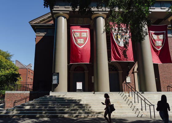 The exterior of Memorial Church as people walk past