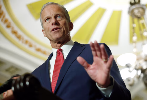 John Thune speaks with reporters