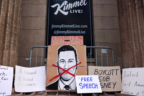 Signs are arranged during a protest at the El Capitan Entertainment Centre, where "Jimmy Kimmel Live!" was recorded for broadcast, in Los Angeles on Sept. 18, 2025. 