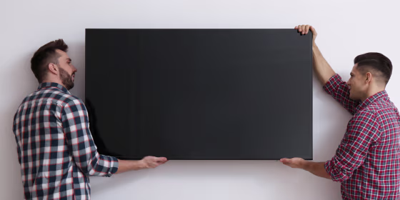 Mounting a TV is best done with at least two people, according to our expert.