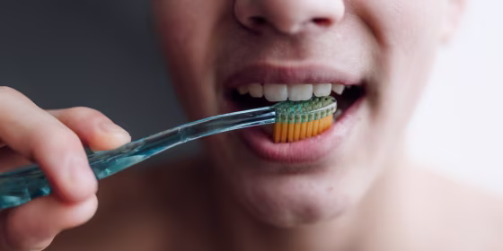Some dental care products, like floss and toothbrushes, are easier to find low-plastic and plastic-free alternatives for than others, like retainers and mouthguards. 