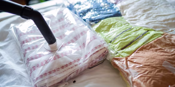 Vacuum storage bags reduce the amount of space off-season clothing takes up, while also protecting it from mold and mildew.