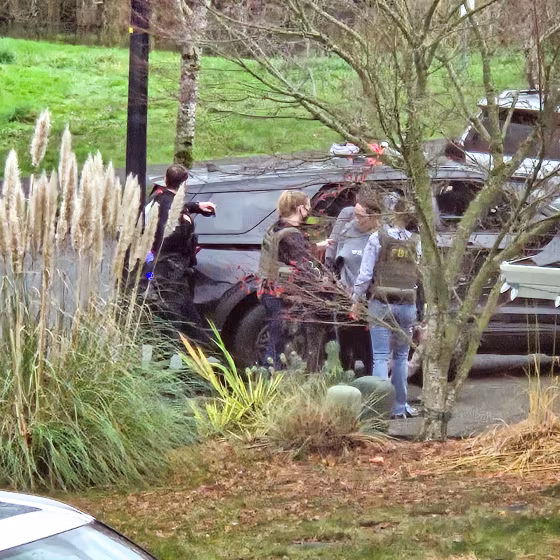 Law enforcement activity outside Megan Hall-Greenberg’s home in Washougal, Wash.