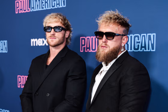 Logan Paul, left, and Jake Paul stand for portraits on the red carpet