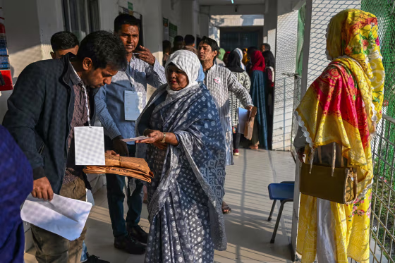 Men and women line up to cast their votes in Bangladesh.