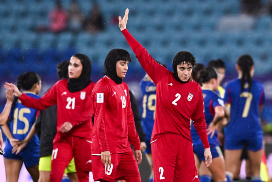 Atefeh Imani waves on the soccer field