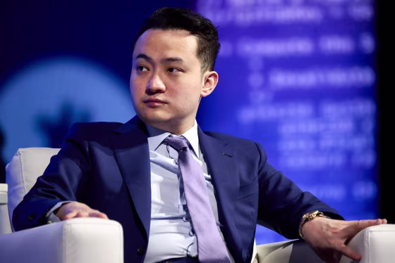 Justin Sun seated on a couch