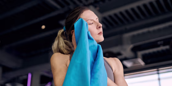 Experts recommend using a cooling towel on specific body parts to lower your temperature as quickly as possible.