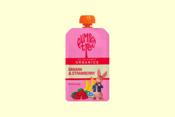 A Pumpkin Tree Peter Rabbit Organics Banana & Strawberry 4 oz. pouch on a light yellow background