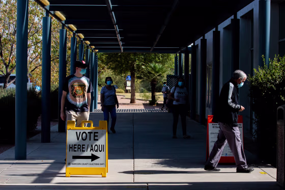 Voters enter Southeast Regional Library to cast their ballots on November 3, 2020 in Gilbert, Arizona. 