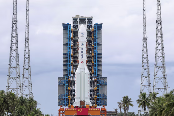 A rocket and booster are displayed upright