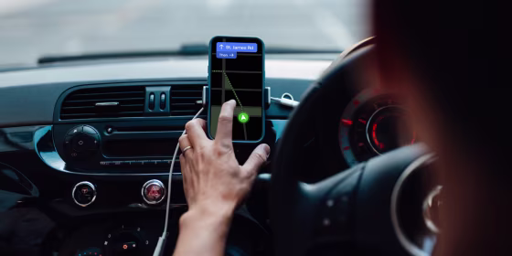 Touching and even tapping your phone could get you fined in many states with new hands-free or no-touch laws. 