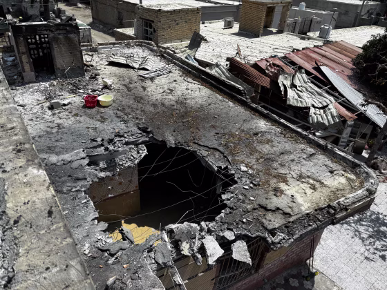 A destroyed rooftop is seen in an aerial view