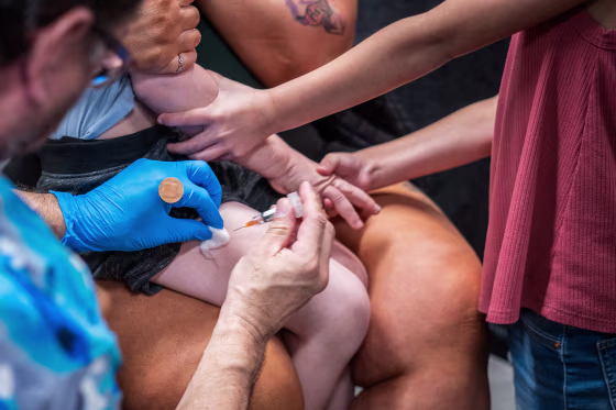 A patient receives a MMR vaccine.