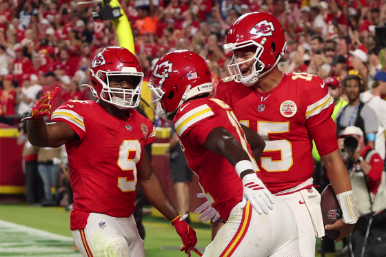 Chiefs' Jalen Royals, center, celebrates a touchdown with Kenneth Walker III, left, and Patrick Mahomes, right, at Arrowhead Stadium.

