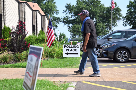 A voter arrives at a polling place on primary election day on Aug. 4, 2026, in St. Louis.