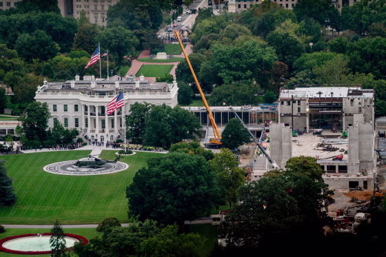 Marine One on the newly completed helipad on the South Lawn and the White House.