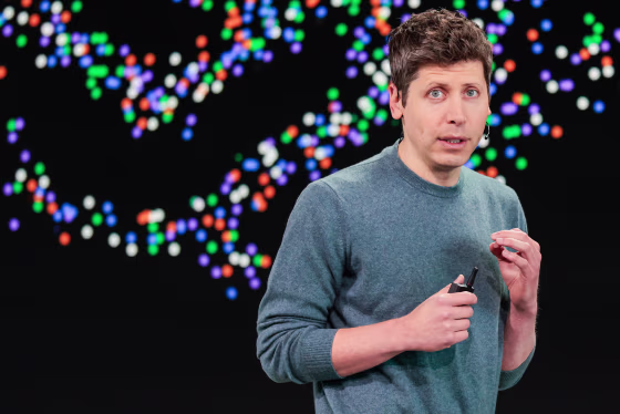 Sam Altman speaks on stage
