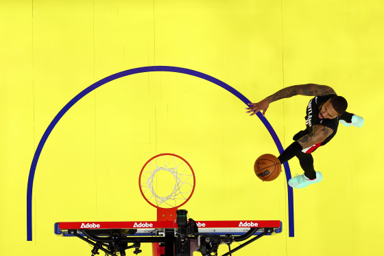 Damian Lillard of the Portland Trail Blazers goes up for a layup against the Golden State Warriors 