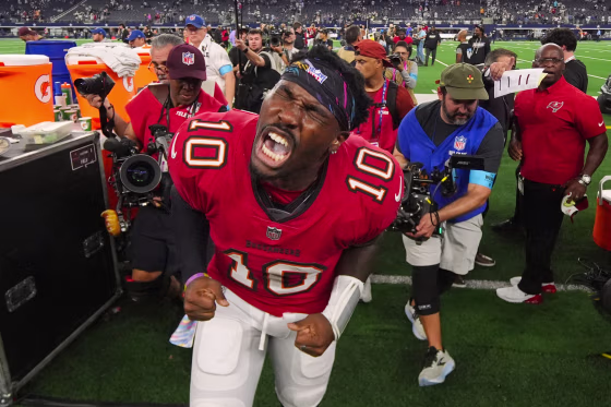 Tampa Bay Buccaneers quarterback Jalon Daniels yells in celebration.