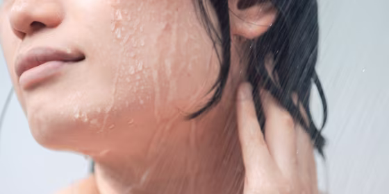 A hot shower can strip skin of its natural moisture, leaving you dry and irritated.