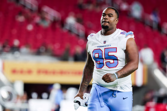 Jordan Elliott walks on the football field