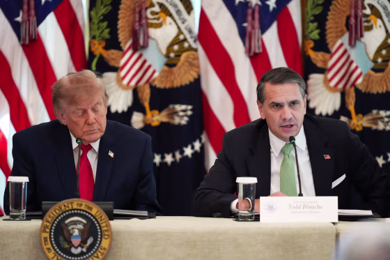 Image: Trump and Todd Blanche attend a roundtable event.