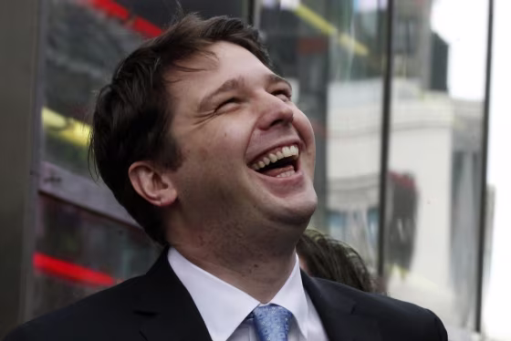 Maybe not so happy today. Groupon Chief Executive Andrew Mason smiles outside the Nasdaq Market following his company's IPO in New York November 4, 2011.