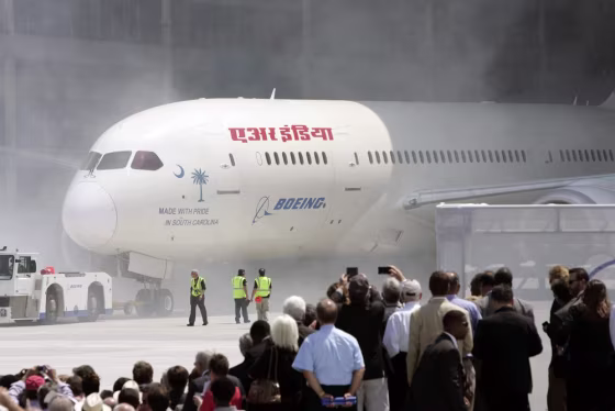 The first 787 Dreamliner passenger jet to be assembled at Boeing's South Carolina facility is rolled out during a ceremony in North Charleston on Friday. The factory stood at the center of a bitter labor dispute last year and the site of a recent manufacturing glitch that threatened to disrupt the 787 production rate target.