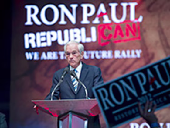 Rep. Ron Paul addresses a crowd of supporters in Tampa before the start of the Republican National Convention.