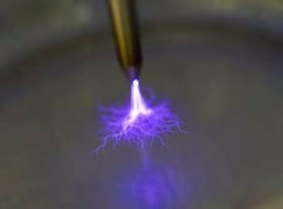 A brief spark in air produces a low-temperature plasma of partially ionized and dissociated oxygen and nitrogen that will diffuse into nearby liquids or skin, where they can kill microbes by generating reactive chemicals.