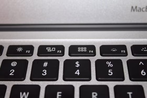 Newer Apple keyboards have the Mission Control and Launchpad features linked to the F3 and F4 keys.