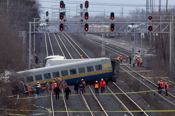 Feb. 26, 2012 - Toronto, ONTARIO, Canada - BURLINGTON, ONT. FEBRUARY 26, 2012 -- A Via Rail train rests across the tracks after a derailment in Burlington, Ontario, Canada on Sunday, February 26, 2012. Three people are confirmed dead with reports of as many as 60 trapped. (Credit Image: © Tyler Anderson/PostMedia News/ZUMAPRESS.com)