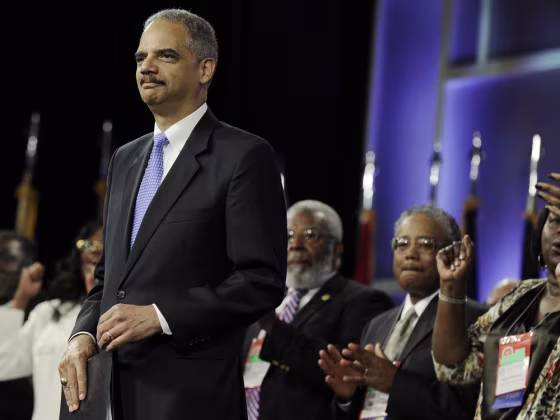 Attorney General Eric Holder says he opposes a new photo ID requirement in Texas elections because it would be harmful to minority voters.