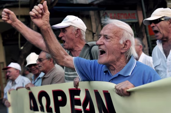 Pensioners march towards the Health Ministry in Athens on July 12, 2012.